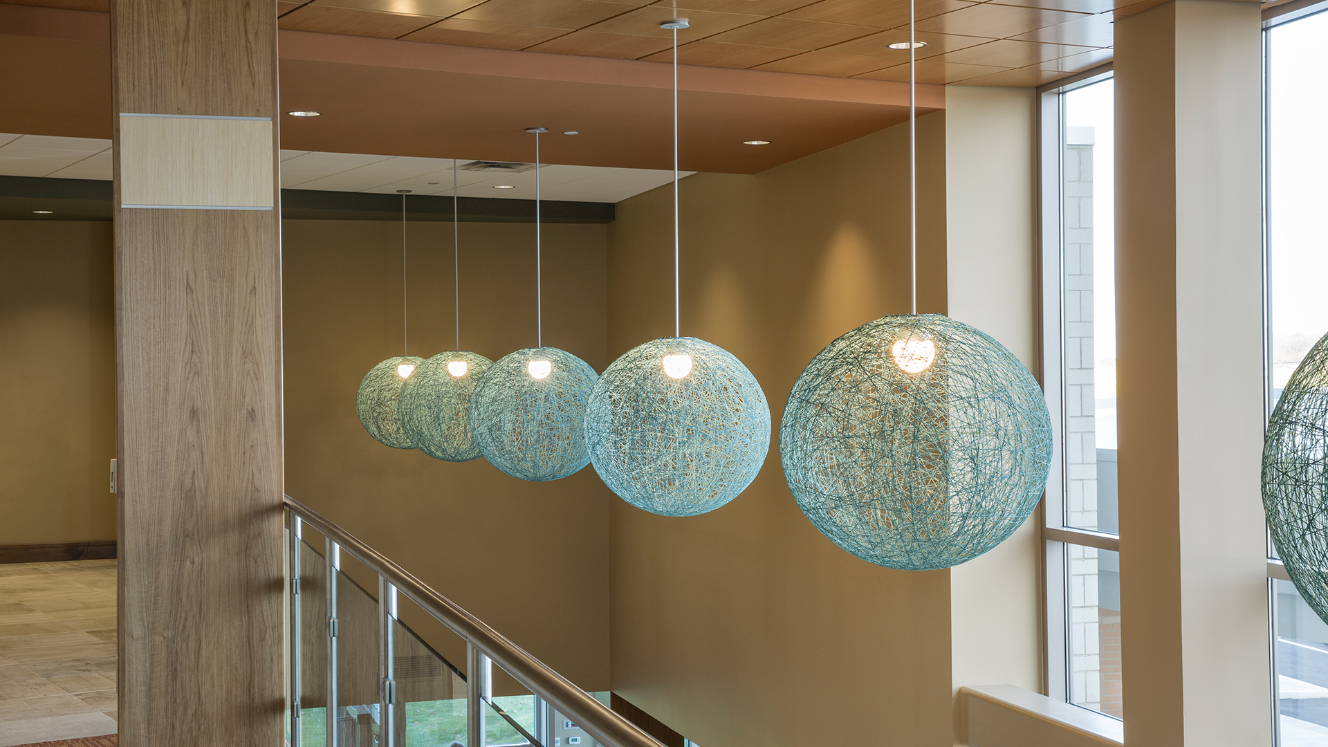 Custom Orb Pendants in Health Clinic Atrium Lobby